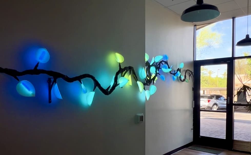 LED Vines Art Installation in a Hallway