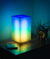 Showing off a vibrant multicolor lighting animation of Monos designer lamp in a bedroom